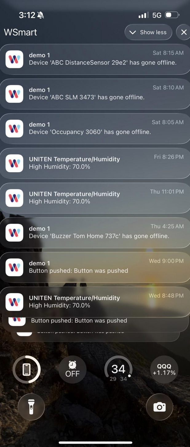 iPhone lock screen stacked with WSmart push notifications for offline devices and humidity alerts